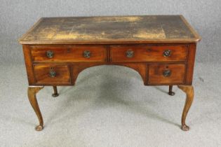 A George II style mahogany writing desk, with a worn leather top. H.76 W.123 D.66cm.