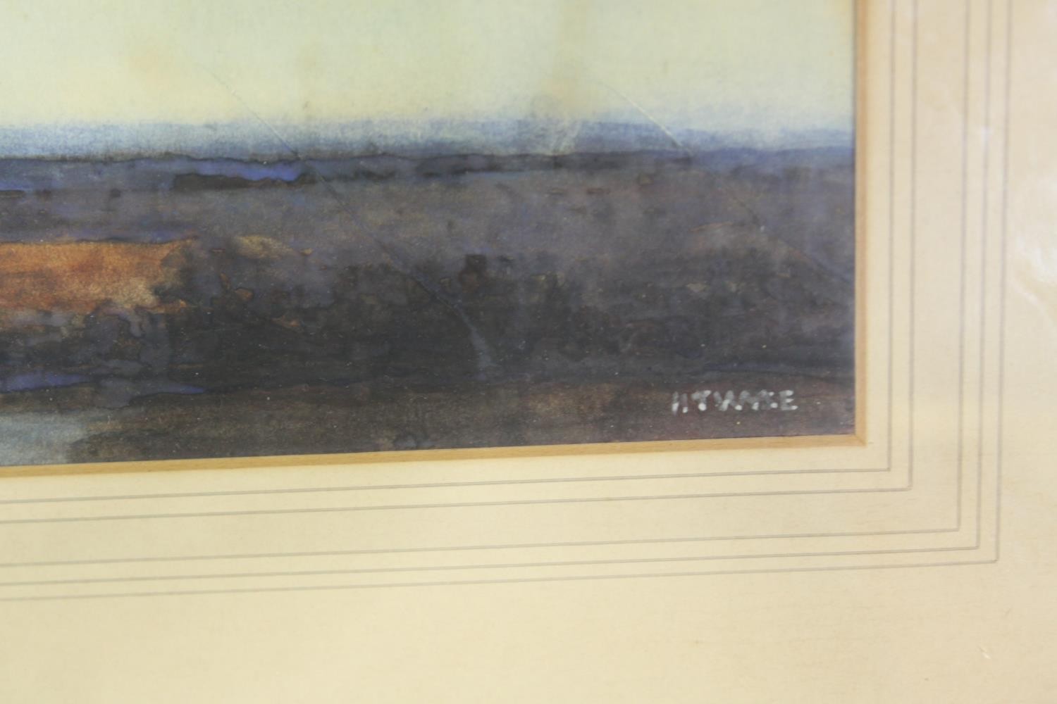 A framed and glazed watercolour, distant hills. signed H T Wyte. H.53 W.70cm. - Image 3 of 4