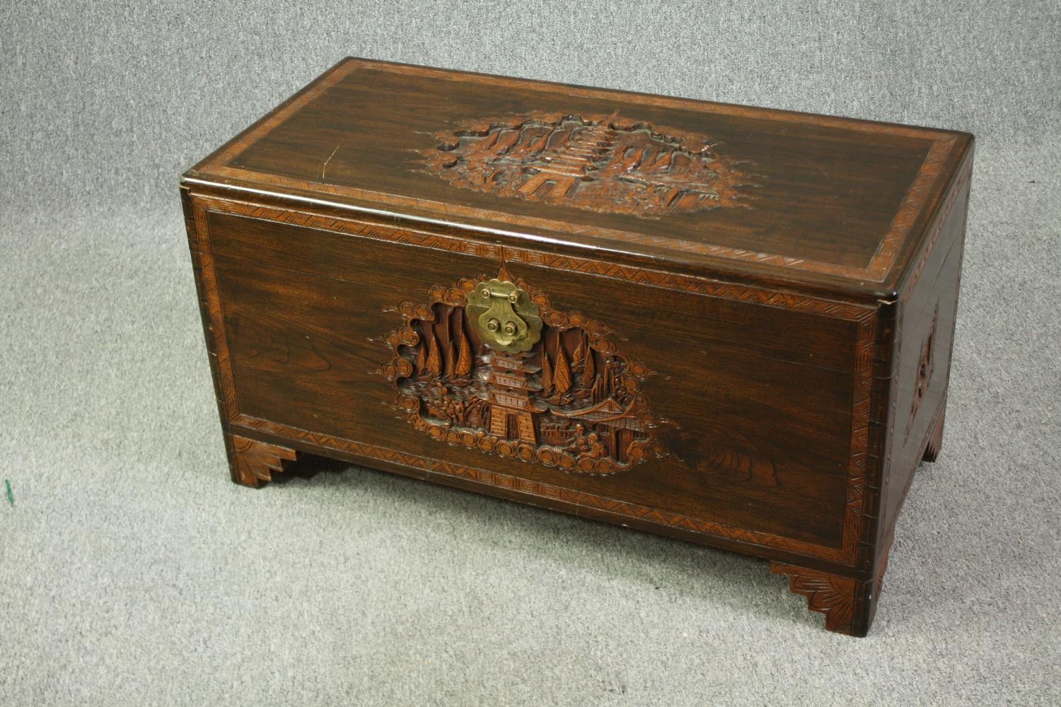 A 1920's Chinese camphorwood chest. H.50 W.93 D.45cm. - Image 3 of 9