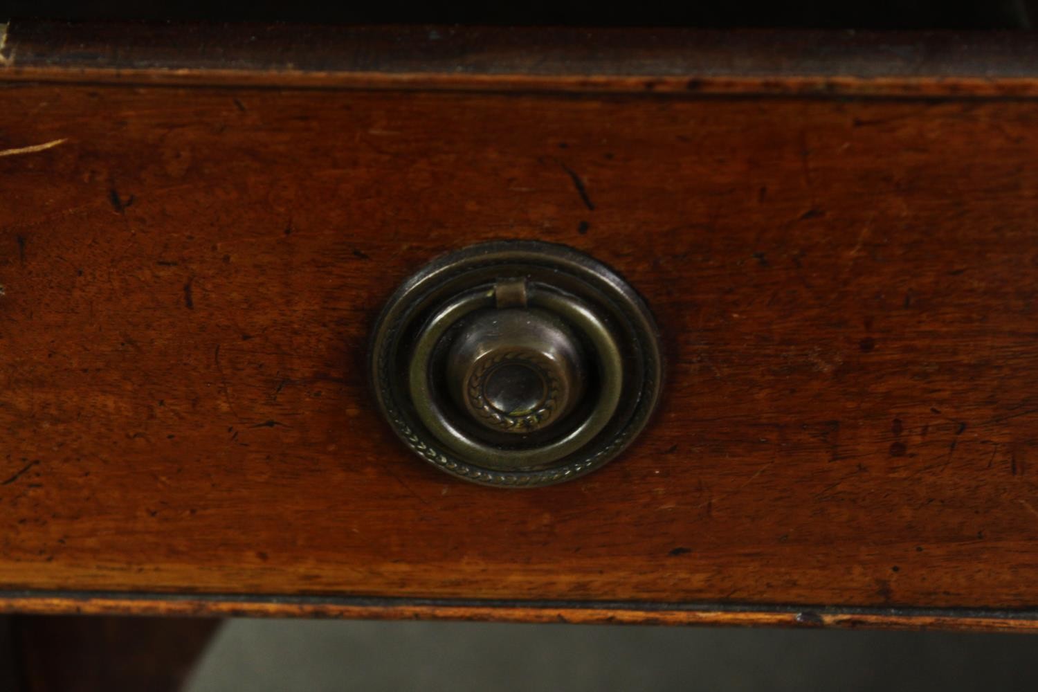 A George II style mahogany writing desk, with a worn leather top. H.76 W.123 D.66cm. - Image 5 of 5