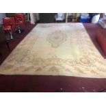 A French Aubusson carpet, with an ivory ground. L.490 W.320cm.