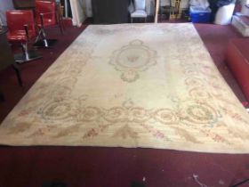 A French Aubusson carpet, with an ivory ground. L.490 W.320cm.