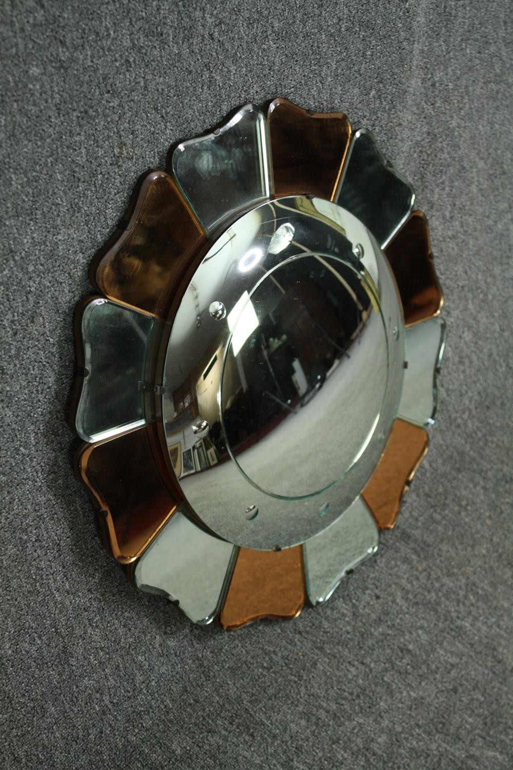 A mid 20th century shaped and partially coloured glass convex mirror, in the form of a flower - Image 2 of 5