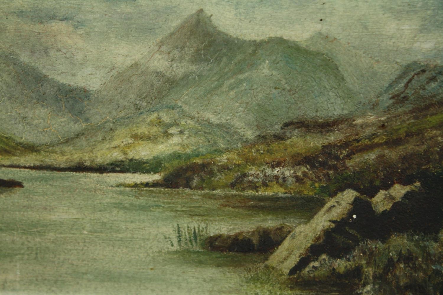 An oil on board, a mountainous landscape with a loch, signed, W.G. Lemon, in an oak frame. H.24 W.