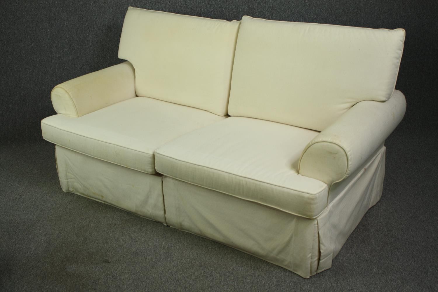 A two seater sofa in ivory upholstery. H.96 W.183 D.95cm. - Image 3 of 5