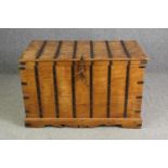 A continental pitch pine and metal bound lidded chest, probably 19th century, H.70 W.110 D.60cm.