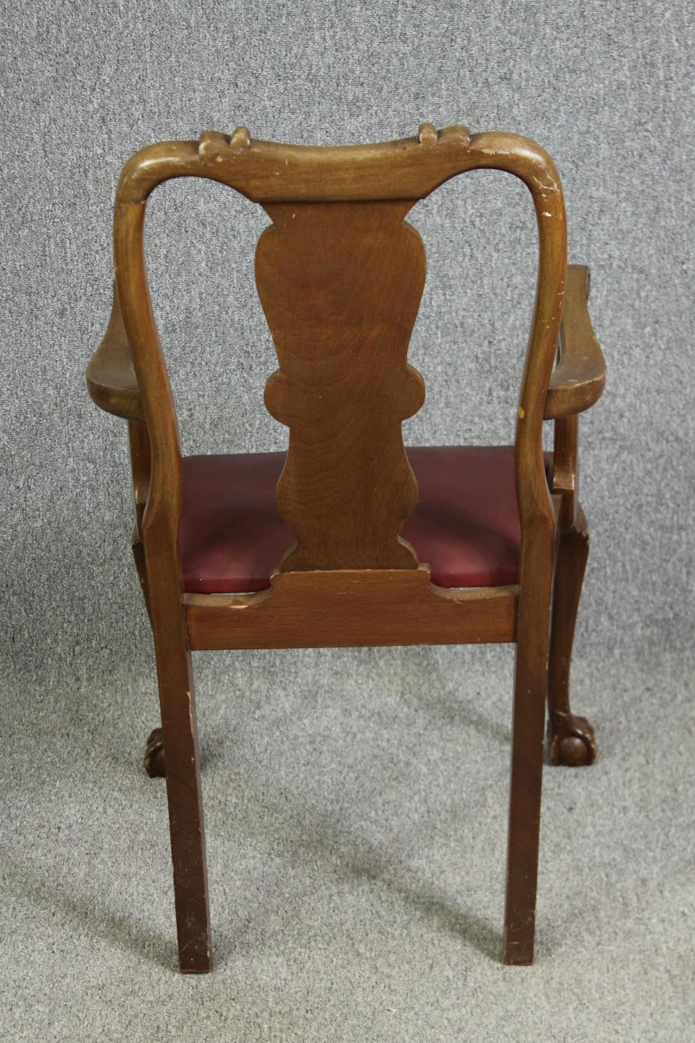 A set of six walnut dining chairs, in the George II style, including two carvers. H.126 W.100 D. - Image 6 of 7