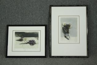 Two prints of flower bouquets, in ebonized frames, indistinctly signed in pencil. H.74 W.54cm, (