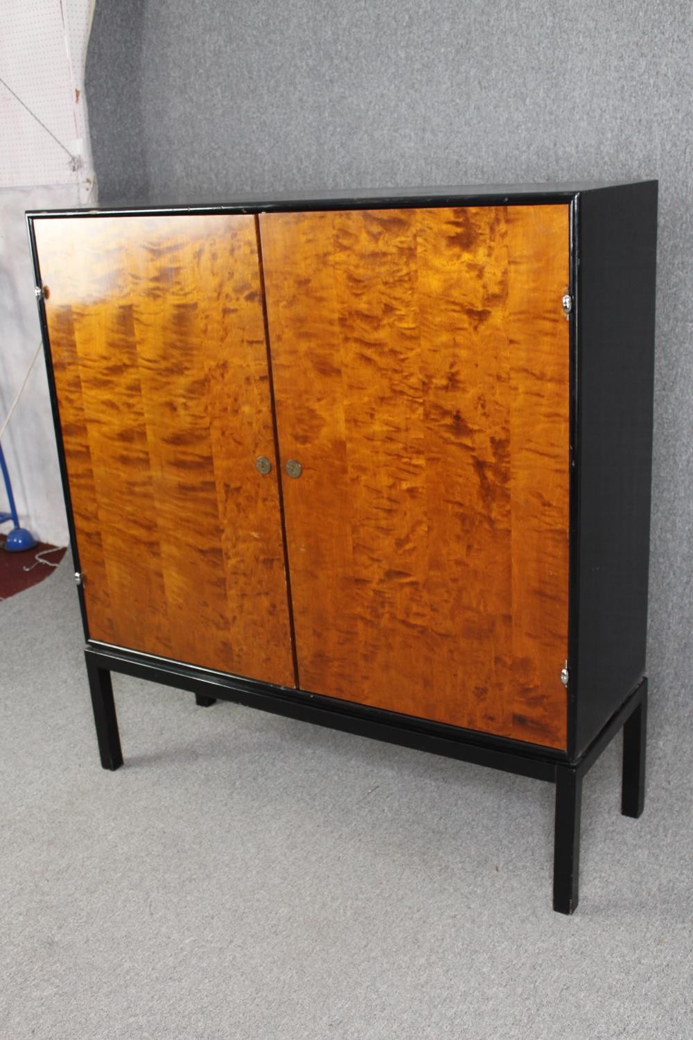 Hall cupboard or linen cabinet on stand, mid century ebonised and section veneered birch. H.139 W. - Image 3 of 6