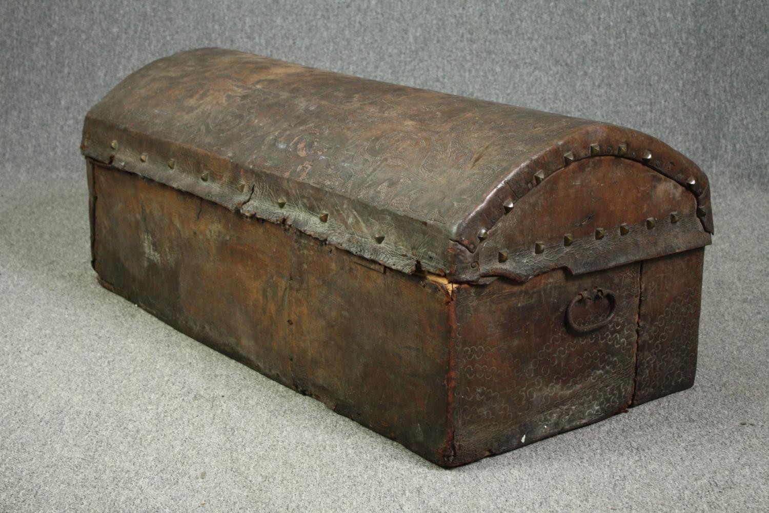 Travelling trunk, 19th century studded embossed leather. H.47 W.110 D.54cm. - Image 7 of 14