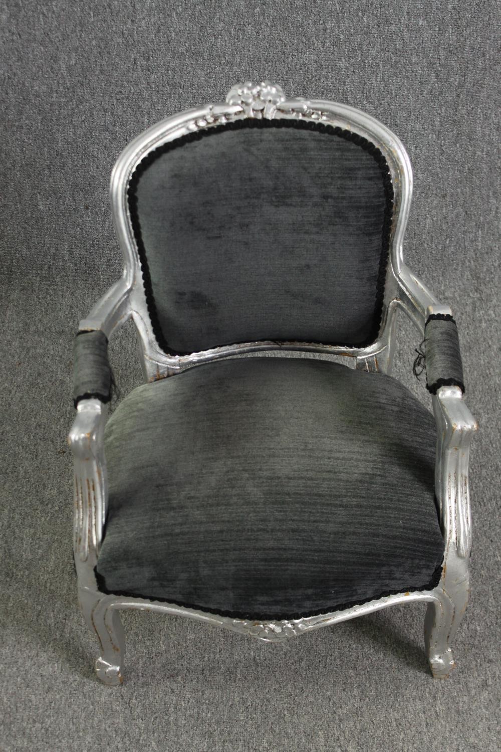 A small Louis XV style silver painted child's armchair. H.67cm. - Image 2 of 4