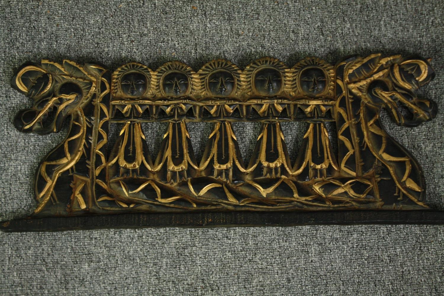 A pair of Indonesian painted head masks, with other smaller associated carvings. L.103 W.42cm. ( - Image 5 of 8