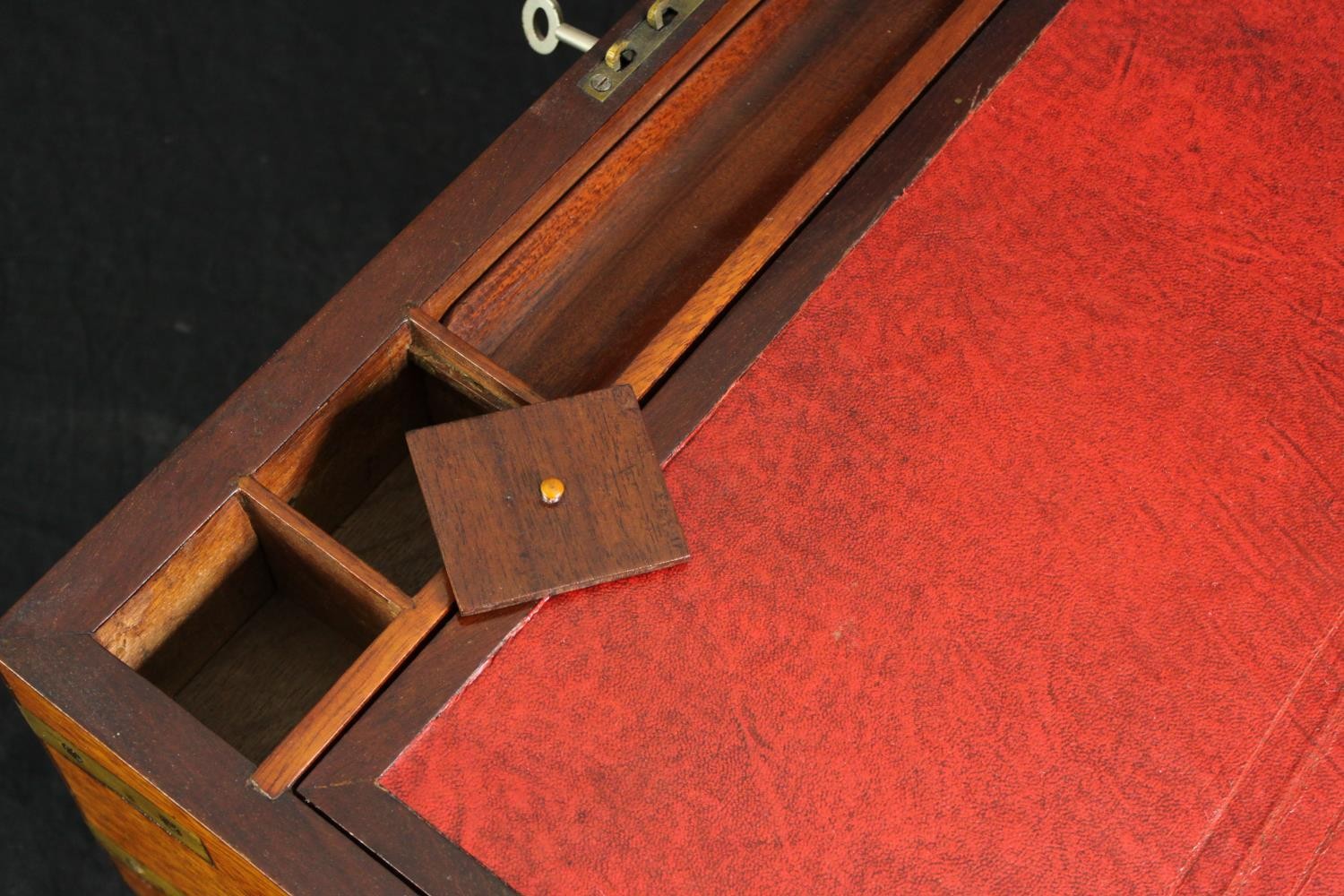 A Victorian mahogany and brass mounted writing slope, with a red leather fitted interior. H.18 W. - Image 5 of 6