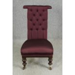 A Victorian mahogany prie dieu chair with modern aubergine textured upholstery. H.96cm.