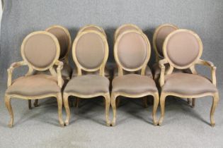 A set of eight Flamant French style limed oak and upholstered dining chairs, including two carvers