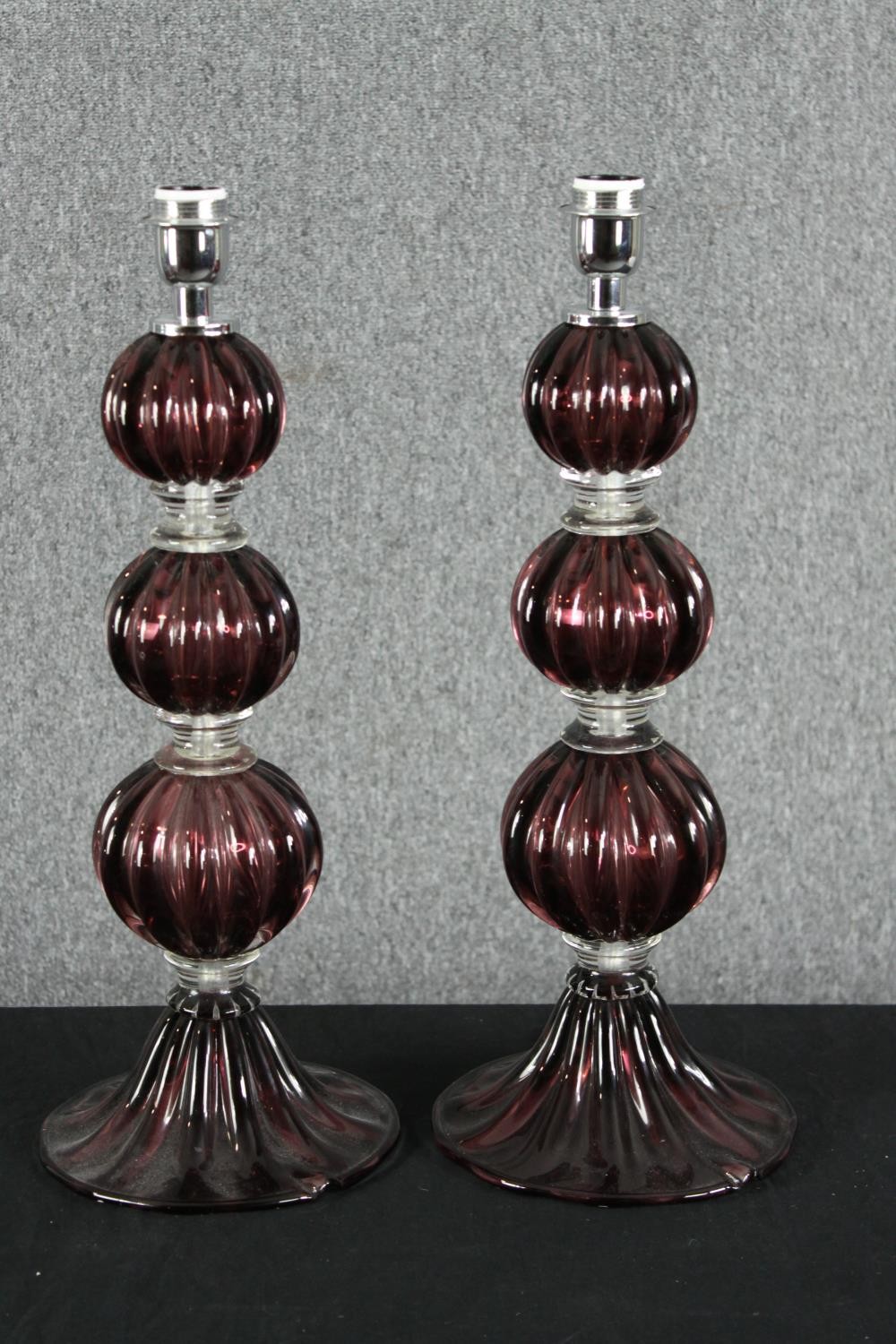 A pair of 1970s Murano glass table lamps, of triple gourd form. H.59cm. (each).
