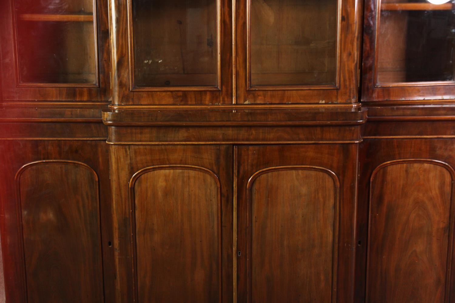 A Victorian mahogany triple breakfront bookcase. H.237 W.183 D.43cm. - Image 8 of 13