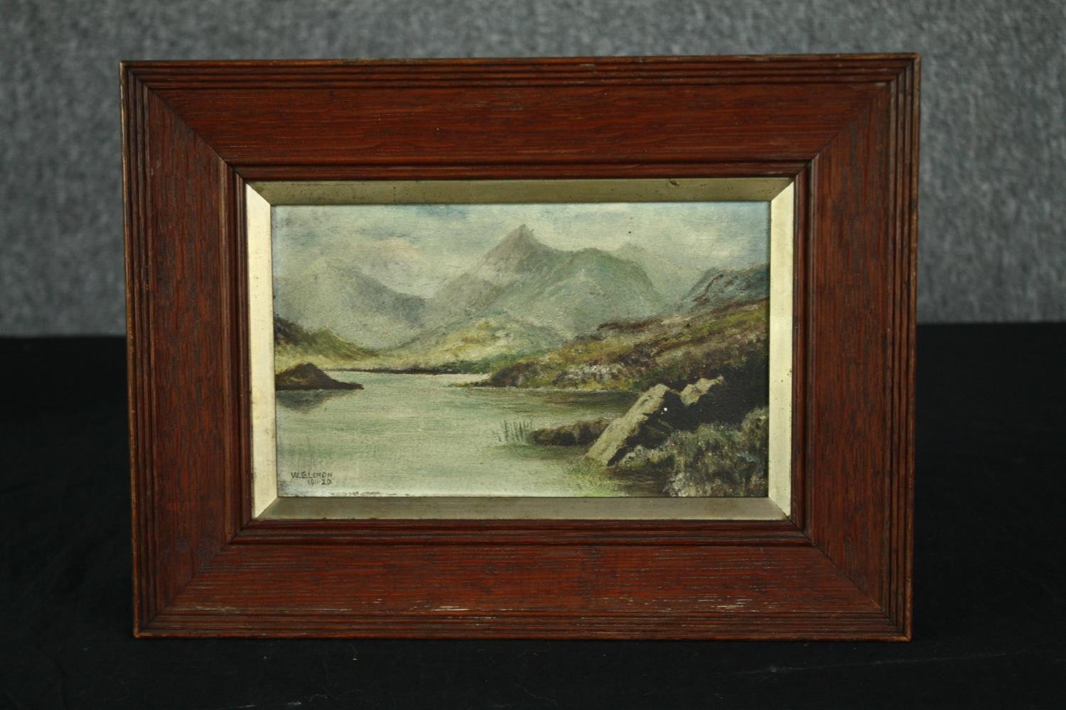 An oil on board, a mountainous landscape with a loch, signed, W.G. Lemon, in an oak frame. H.24 W. - Image 2 of 4