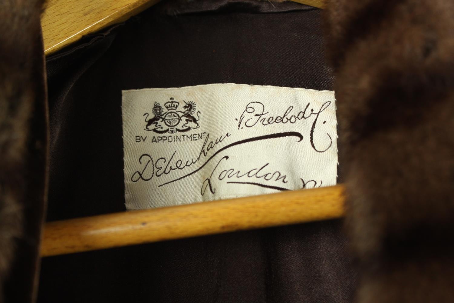 A Debenham and Freebody, London, vintage velvet and fur collared evening coat. Makers label to - Image 5 of 9