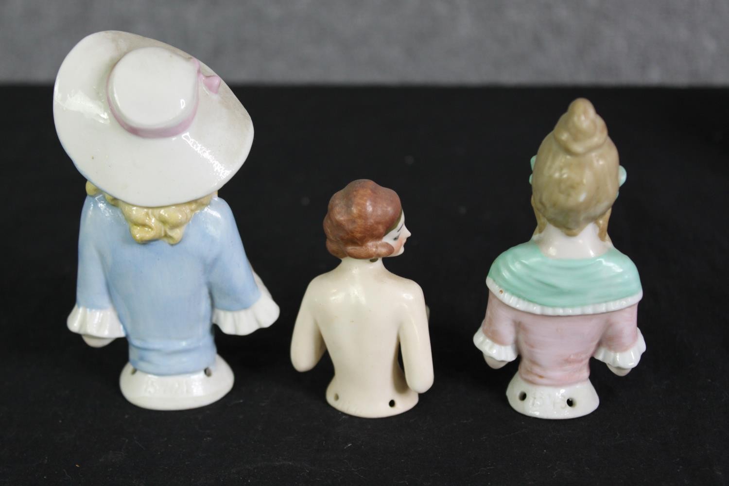 WITHDRAWN- A group of four ceramic doll pin cushions. H.13cm. (largest). - Image 7 of 7
