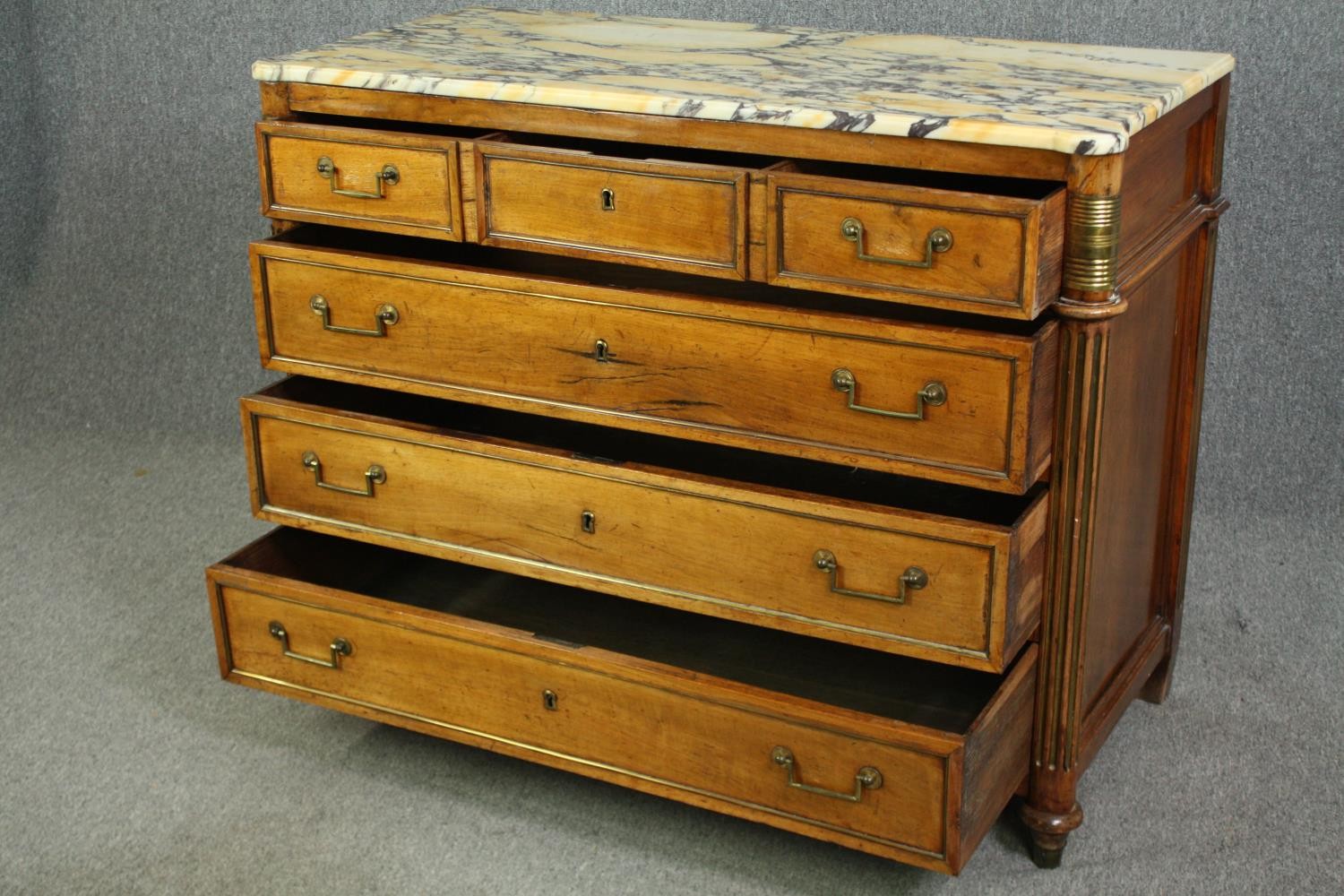 A French Directoire walnut commode, with a breccia marble top, 19th century. H.98 W.126 D.57cm. - Image 8 of 11