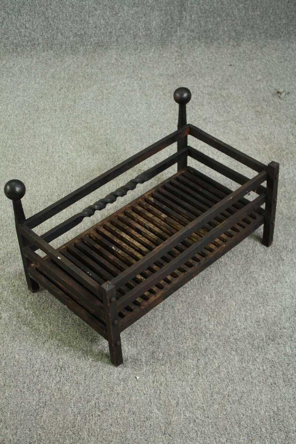 A cast iron fire grate. H.36 W.61 D.36cm. - Image 2 of 5