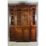 A Victorian mahogany triple breakfront bookcase. H.237 W.183 D.43cm.