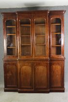 A Victorian mahogany triple breakfront bookcase. H.237 W.183 D.43cm.
