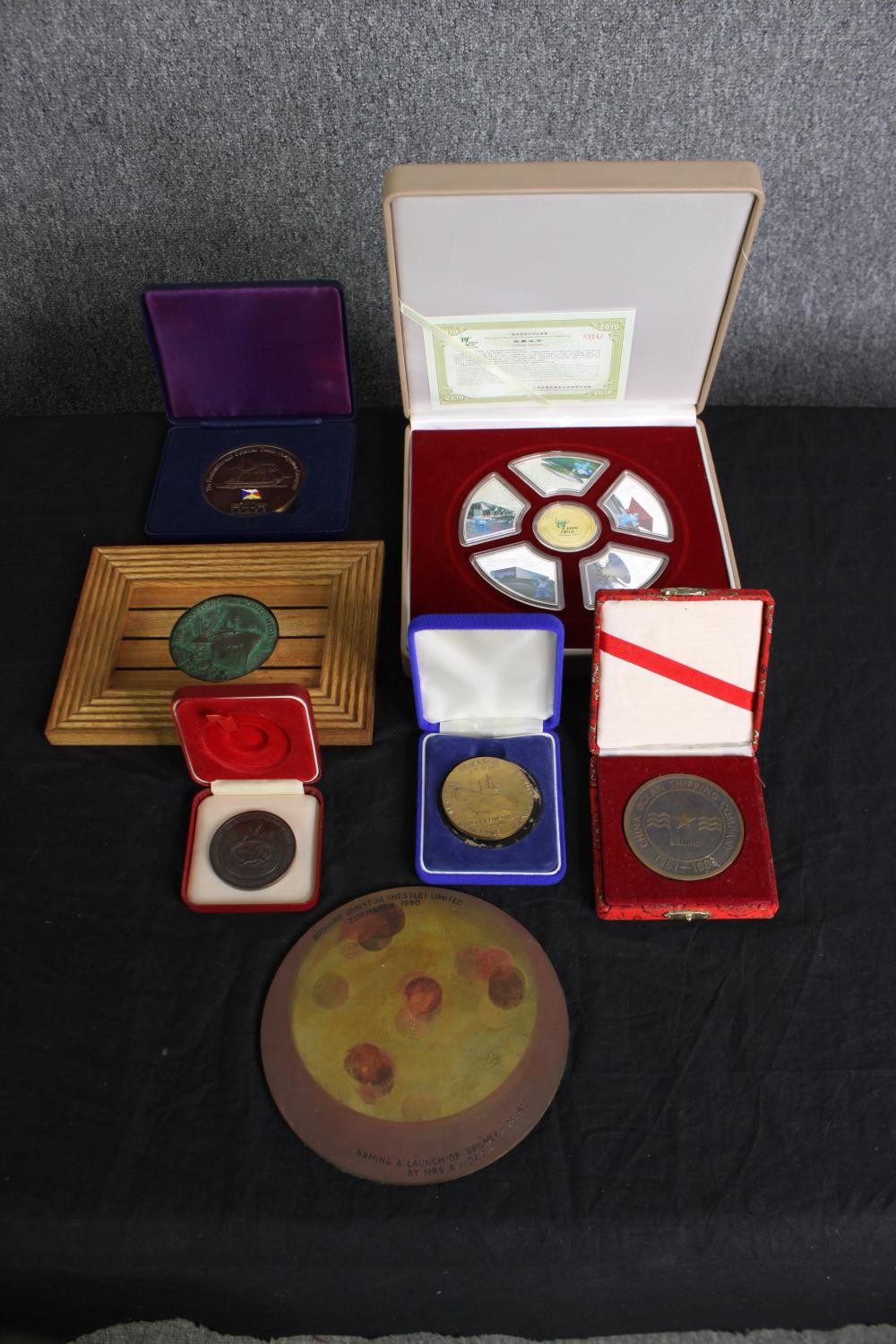 A group of Chinese and other commemorative shipping medallions. H.5 W.22 D.22cm. (largest). - Image 2 of 24