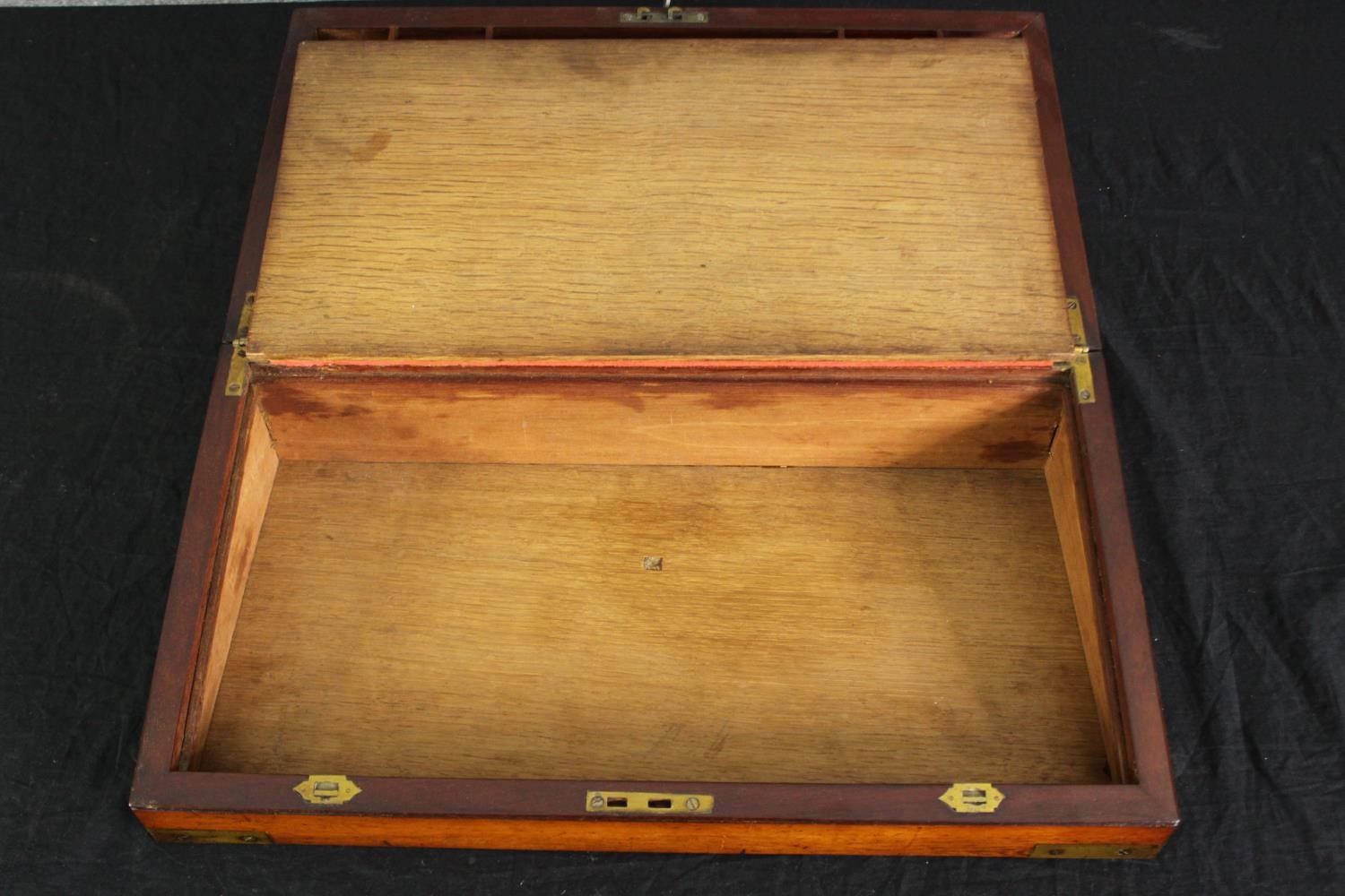 A Victorian mahogany and brass mounted writing slope, with a red leather fitted interior. H.18 W. - Image 3 of 6