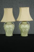 A pair of celadon glazed baluster table lamps, with bamboo decoration. H.49cm. (largest).