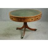 A Regency mahogany drum top library table, with a green tooled leather inset top, 19th century. H.76