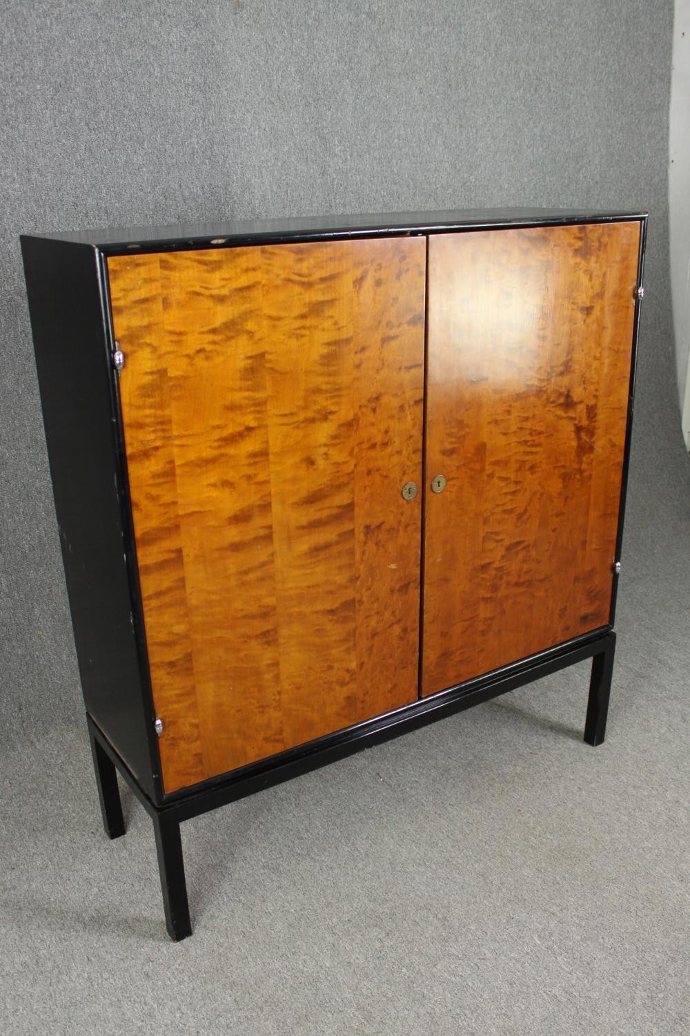 Hall cupboard or linen cabinet on stand, mid century ebonised and section veneered birch. H.139 W. - Image 2 of 6