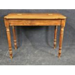 A George IV mahogany side table with hinged lid. H.75 W.95 D.52cm.