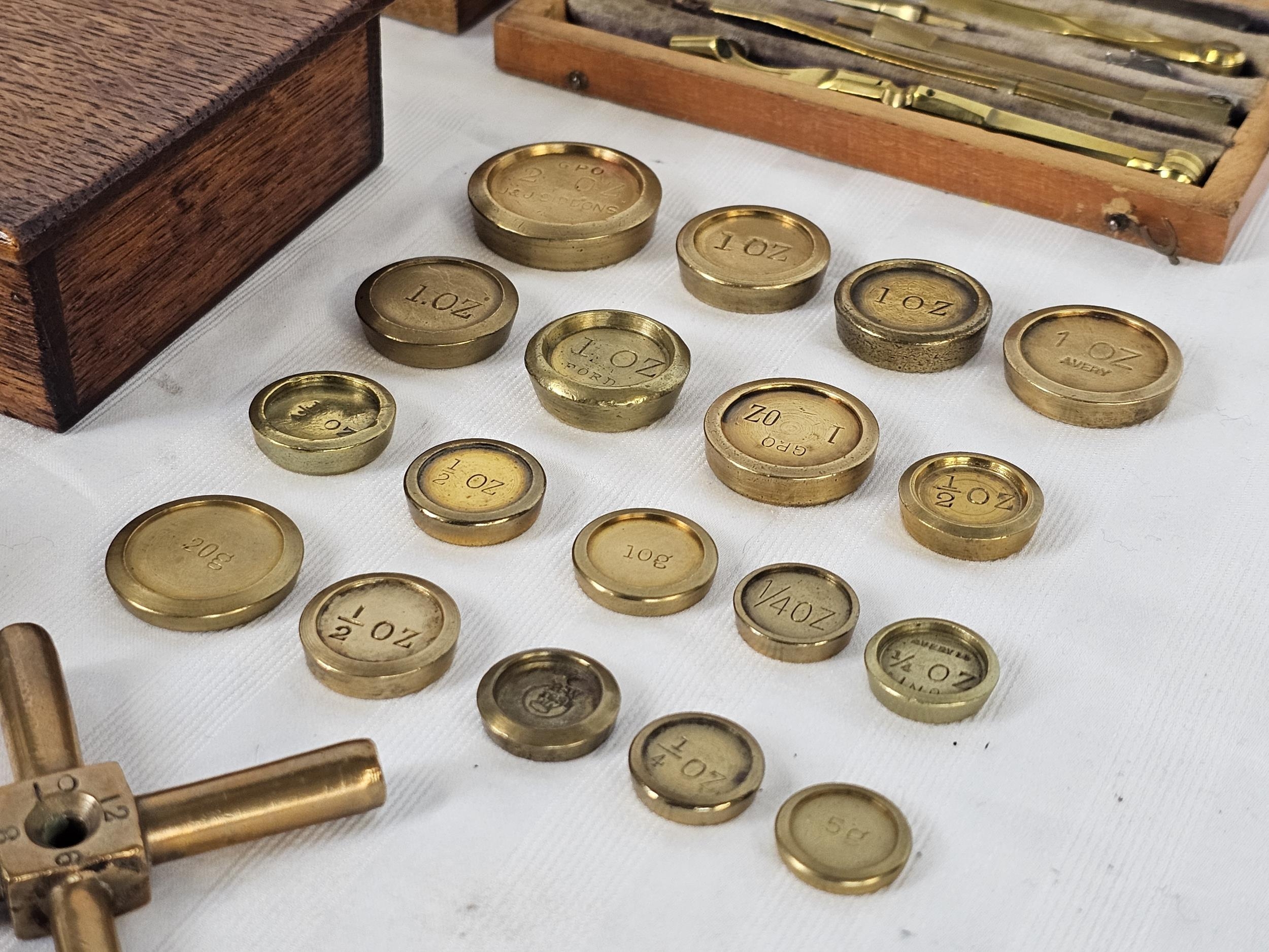 A large group of vintage brass weights, draughtman's geometry set, scales and rules plus two - Image 12 of 15