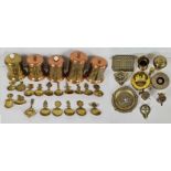 Large quantity of brass items including a Lipton British Empire Exhibition tea caddy and a desk