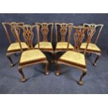 A set of six George II style carved mahogany dining chairs, 20th century. H.102