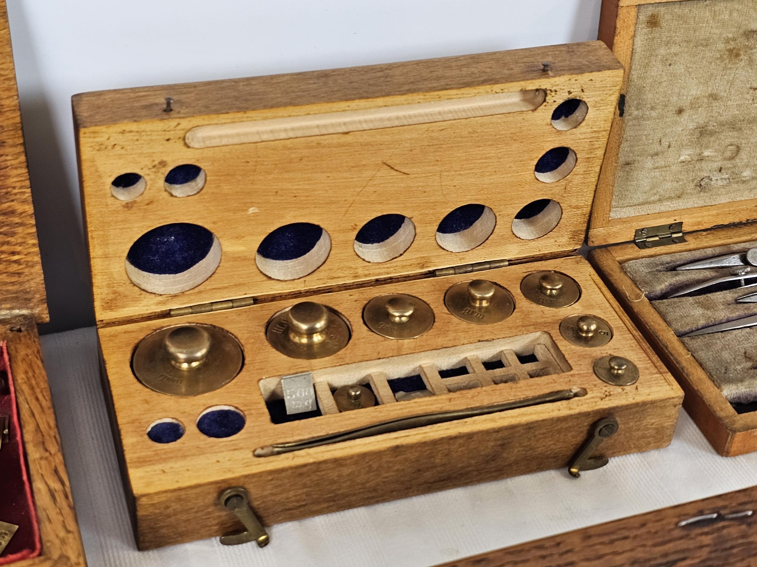 A large group of vintage brass weights, draughtman's geometry set, scales and rules plus two - Image 13 of 15