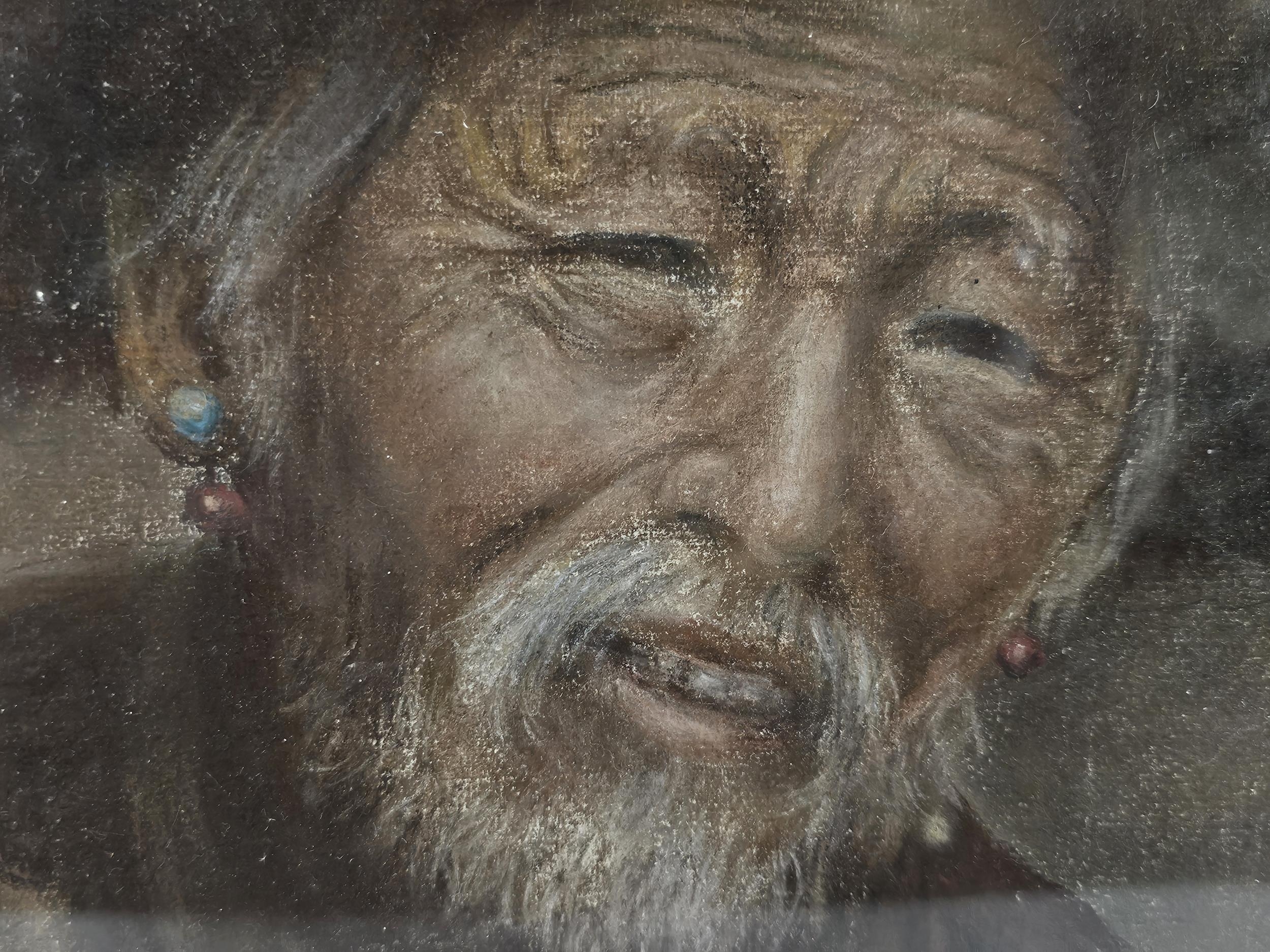 A pastel portrait of a Tibetan man, indistinctly signed, in a giltwood and glazed frame. H.45 W. - Image 4 of 5