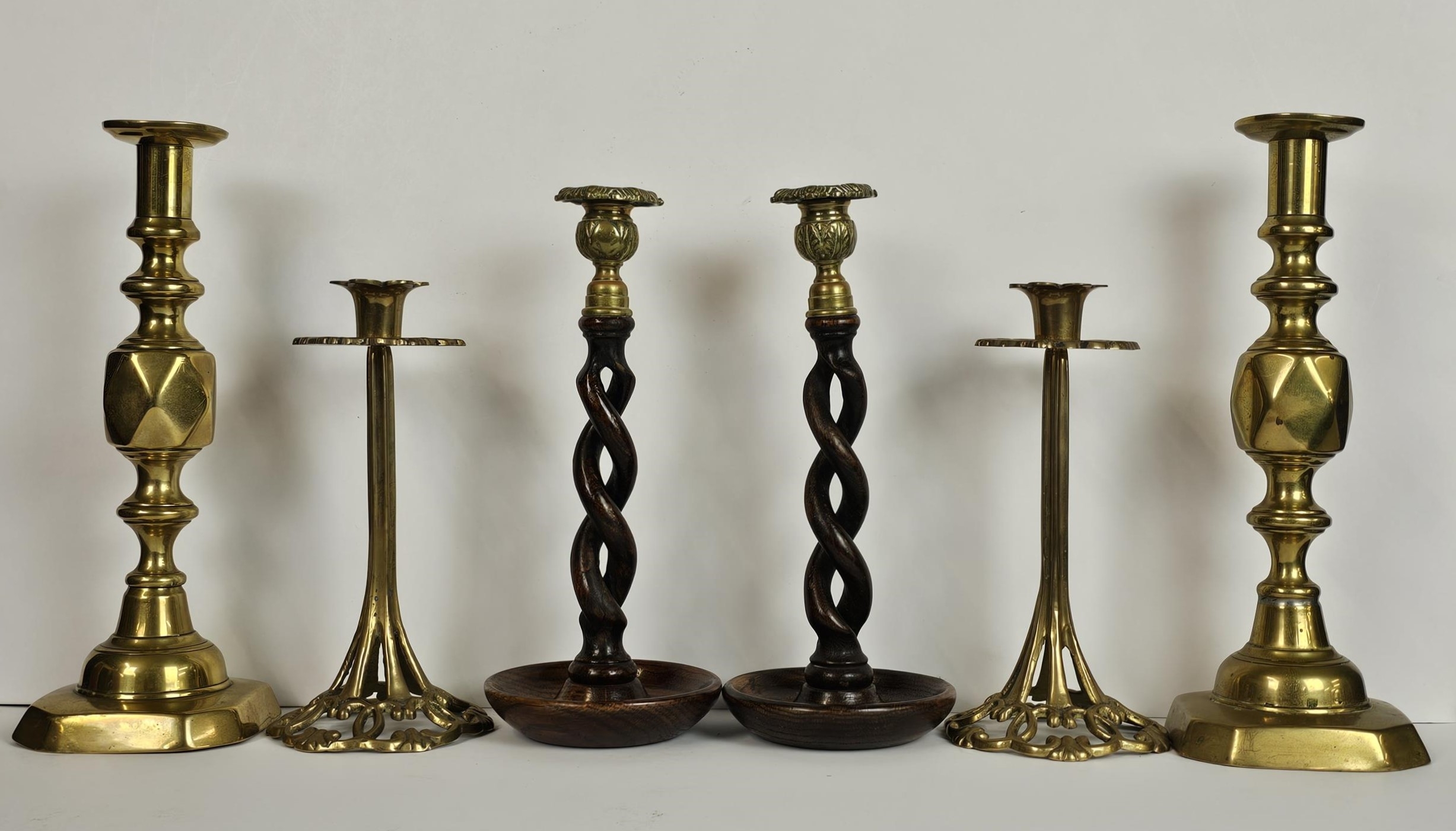 A good collection of 19th and 20th century pairs of candlesticks including 'King of Diamonds, Barley