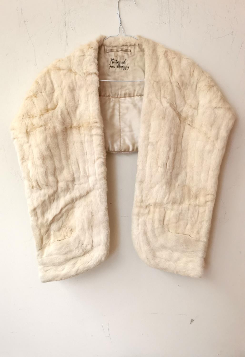 A vintage white mink fur sole with front pockets, with designer label 'National Fur Co Ltd. and - Image 2 of 9