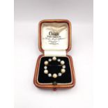 An antique leather boxed French yellow and white metal (tests as 18ct gold) old cut diamond and