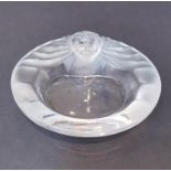 A vintage Lalique raised lion head clear crystal ashtray. Signed to the base Lalique, France. H.14.5