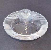A vintage Lalique raised lion head clear crystal ashtray. Signed to the base Lalique, France. H.14.5