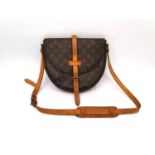 A Louis Vuitton Chantilly monogram shoulder bag, with tan leather adjustable strap. W.6.5 L.27 H.