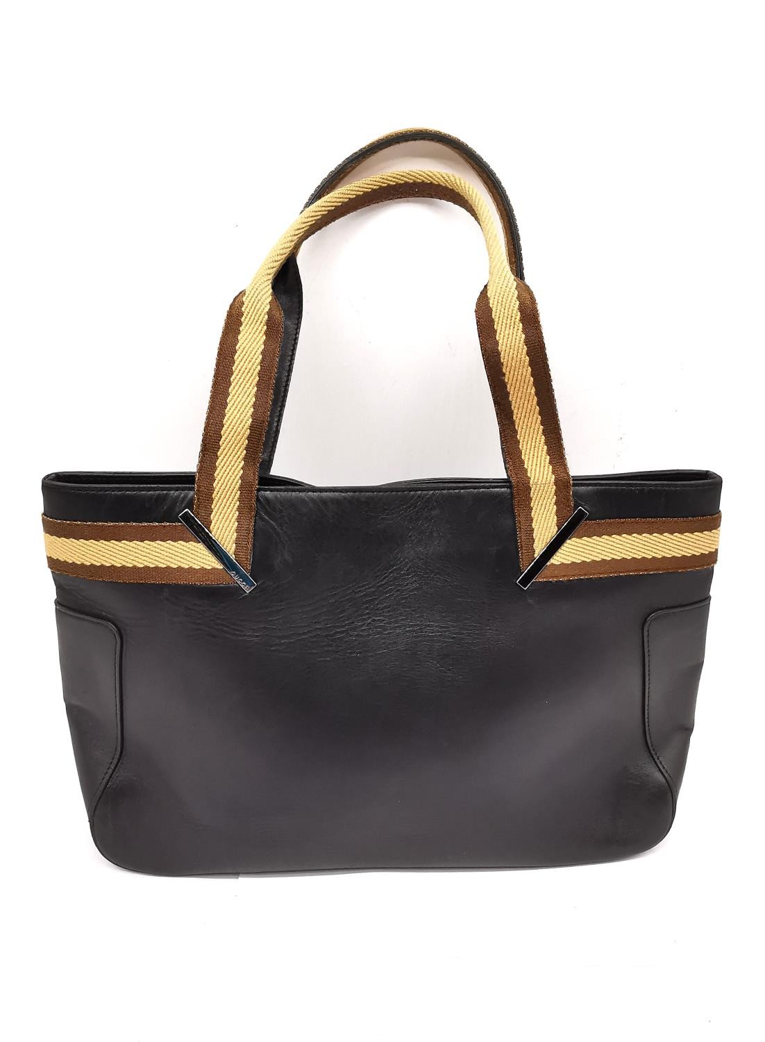 A Gucci Black web leather tote handbag with brown and beige strap. Magnetic snap closure and - Image 5 of 9