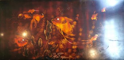 A 20th century Chinese lacquered wooden panel depicting carp and fantail gold fish among water