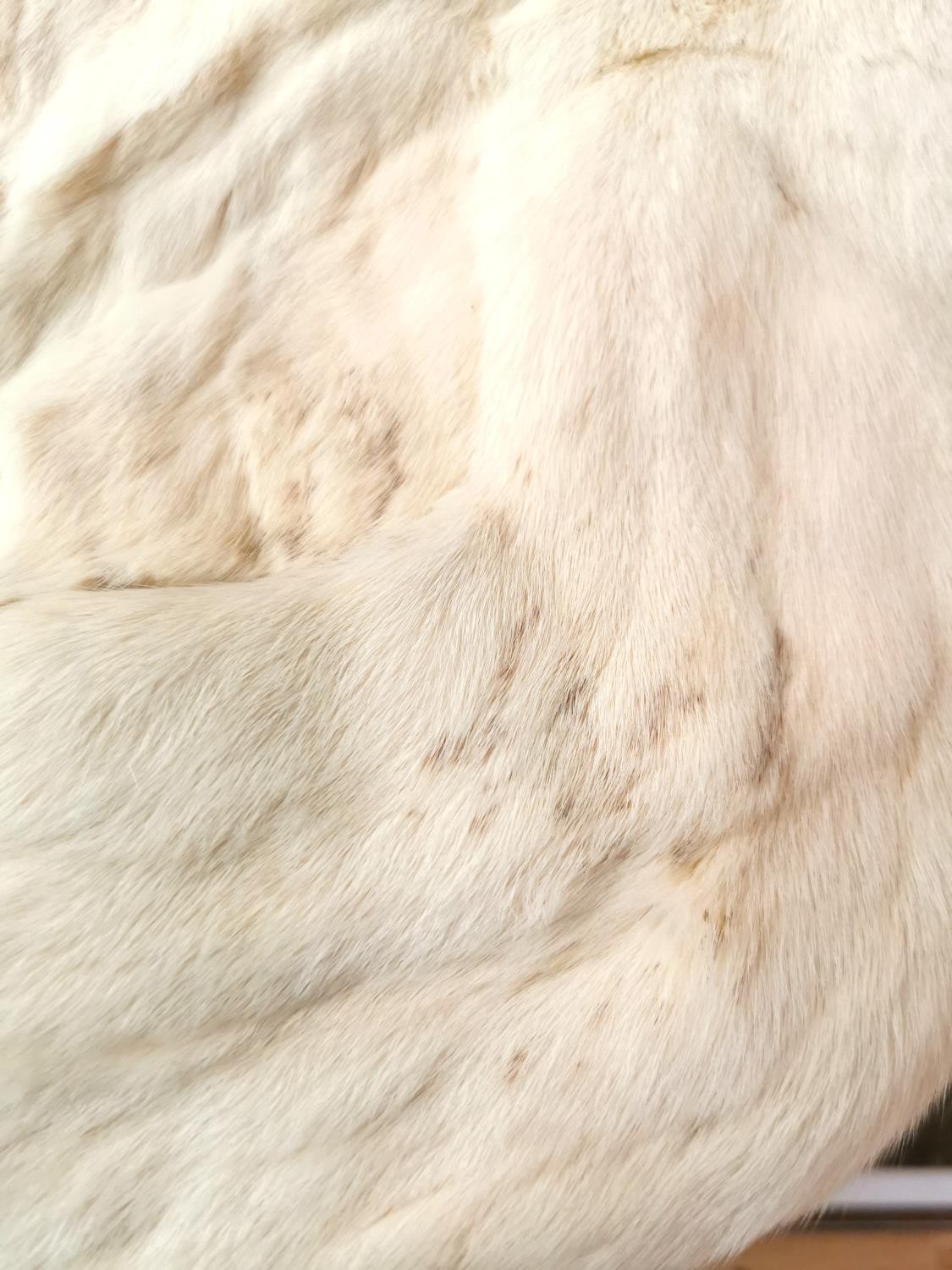 A vintage white mink fur sole with front pockets, with designer label 'National Fur Co Ltd. and - Image 9 of 9