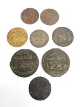 A collection of eight coins, to include two Arabic coins depicting a cockerel and two Moroccan Falus