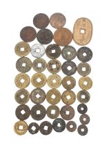 A collection of Chinese, Japanese and Asian coins, including tokens from Hong Kong, one cent coins